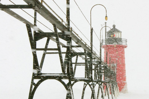 Lighthouse at South Haven, Michigan during a snow squall.